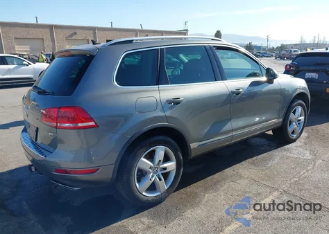 2014 Volkswagen Touareg Tdi Lux z USA, uszkodzony, nr VIN WVGEP9BP7ED013971